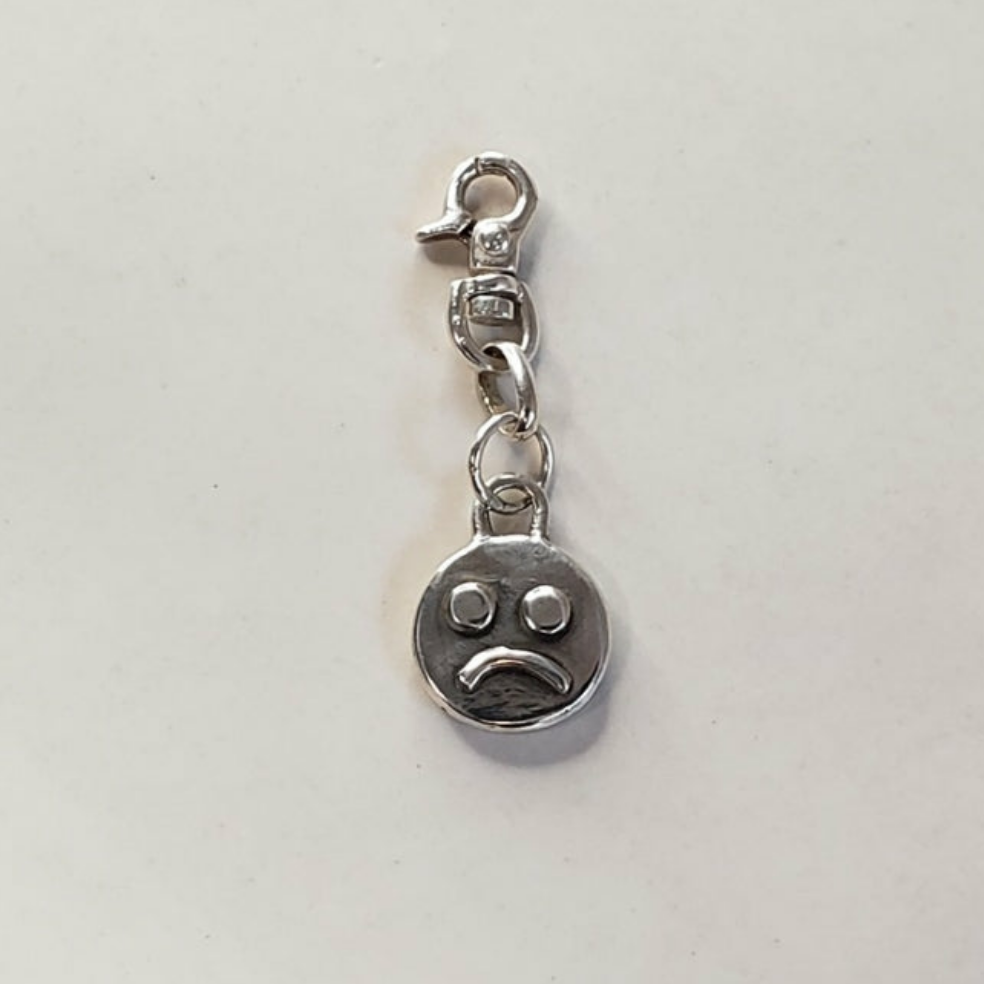 Mixed emotion charm