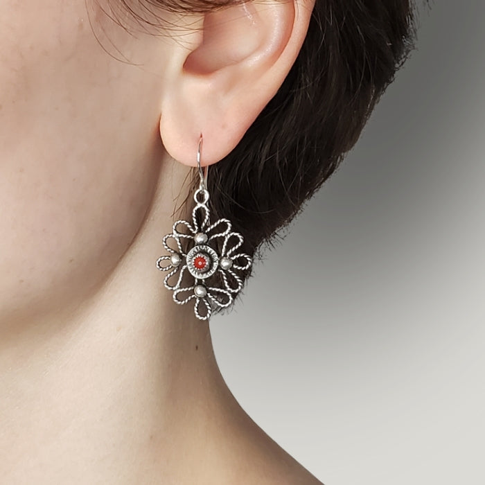 Silver scroll earrings with red coral
