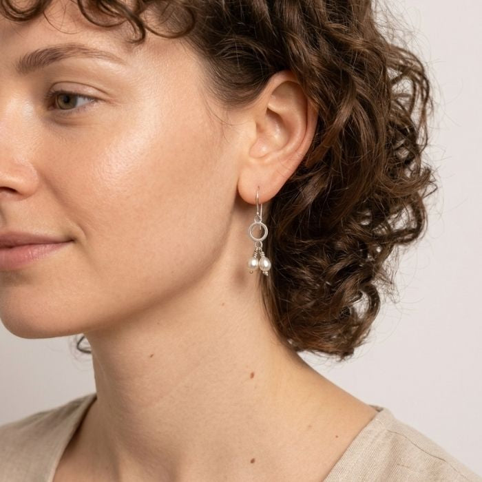Pearl pom pom earrings