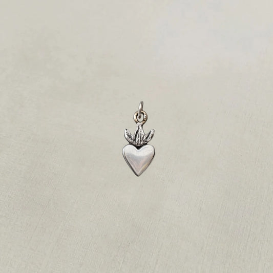 Sterling silver milagros charm pendant