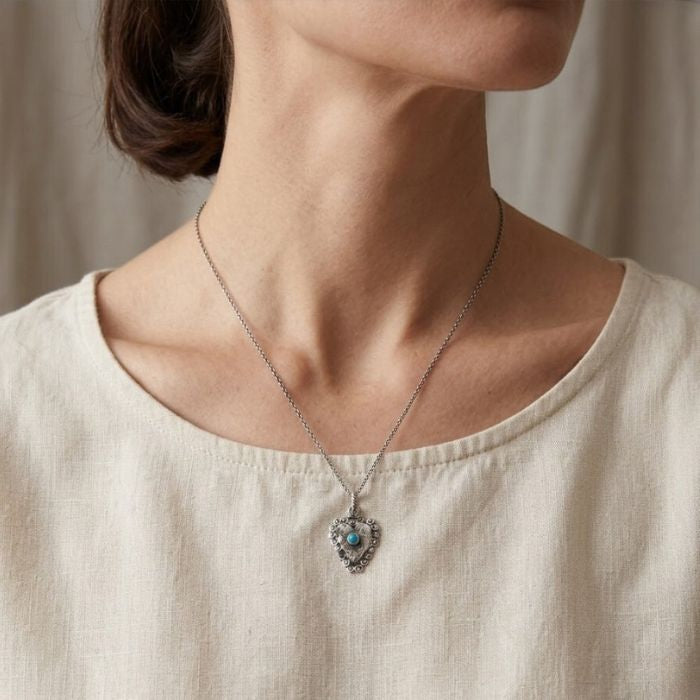 Sterling silver Milagros heart charm pendant