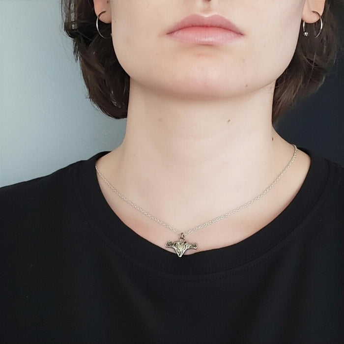 Silver milagros charm pendant