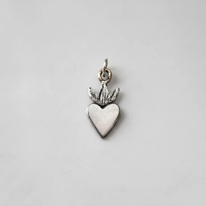 Sterling silver milagros charm pendant