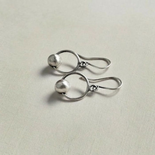 Sterling silver hoop earrings with bead