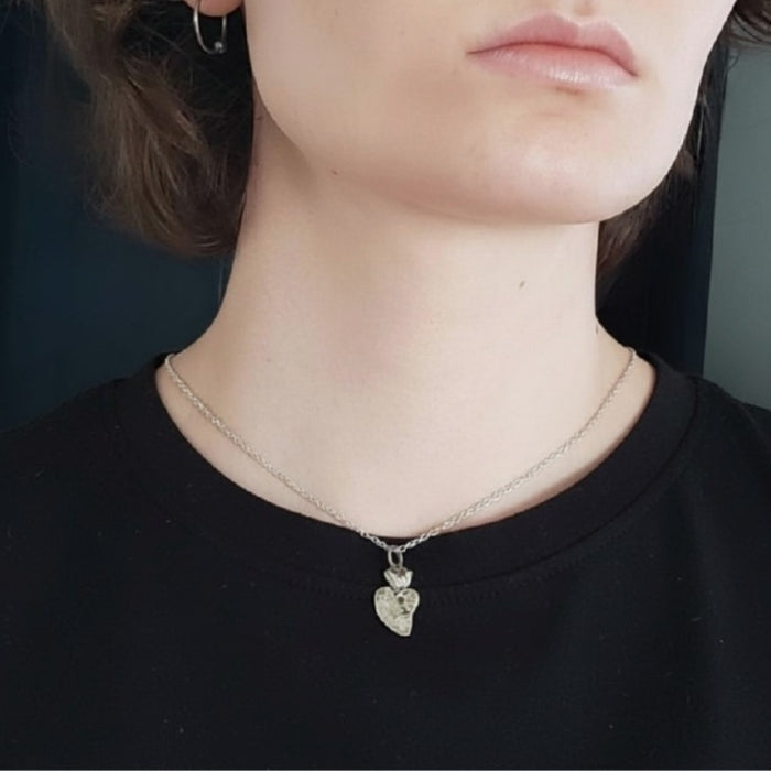 Silver milagros charm pendant