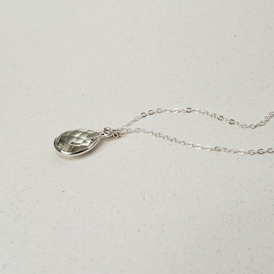 This is a beautiful pale green amethyst faceted gemstone necklace in the shape of a tear drop. This gemstone tear drop pendant is hung on a dainty sterling silver cable chain, 18" in length. This handmade gemstone necklace is all sterling silver and natural gemstone. Ready to ship