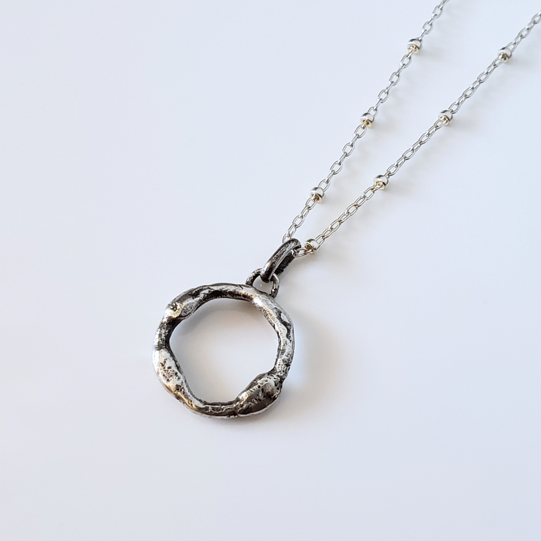 Molten pendant necklace