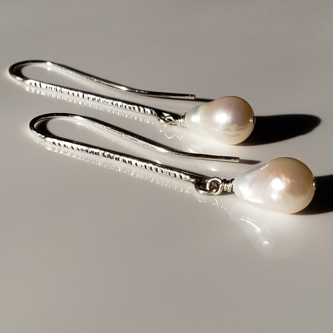 Long pearl earrings