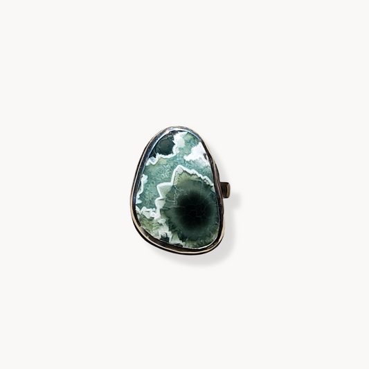 Large gemstone ring on white background