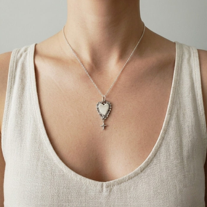 Ruffled silver heart pendant