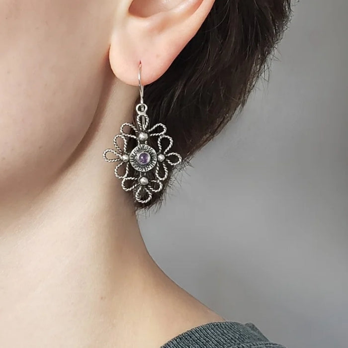 Silver scroll earrings with amethyst