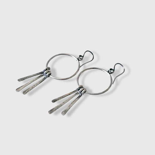 Silver hoop earrings with long dangles