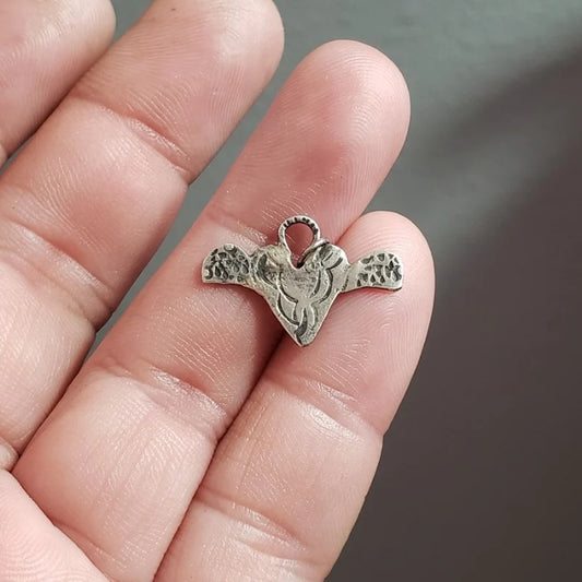 Silver milagros charm pendant