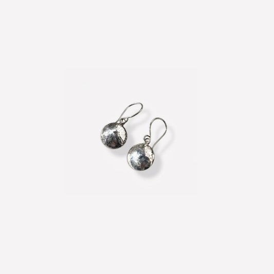 Hammered silver dome earrings on wires