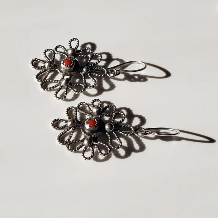 Silver scroll earrings with red coral