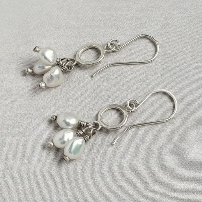 Pearl pom pom earrings