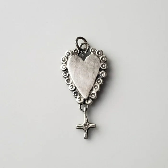 Ruffled silver heart pendant