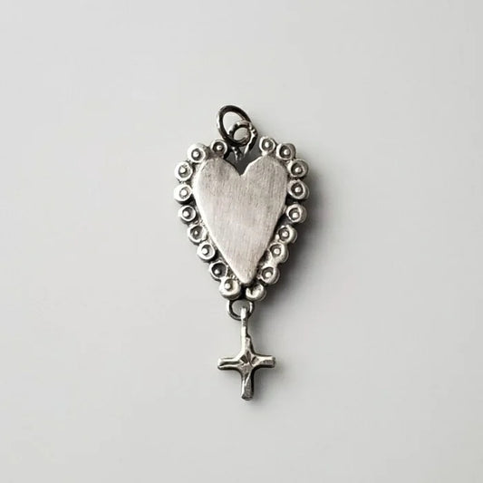 Ruffled silver heart pendant