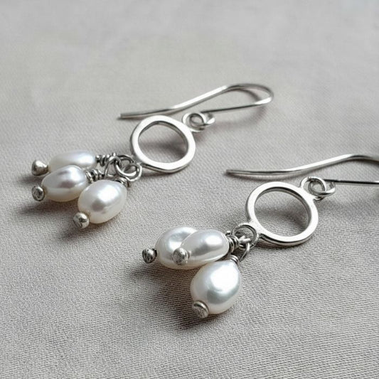 Pearl pom pom earrings