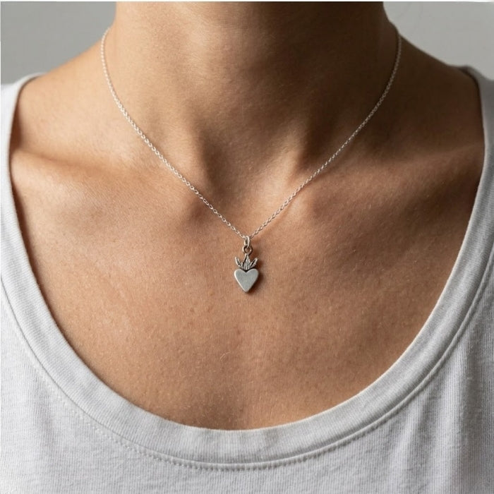 Sterling silver milagros charm pendant