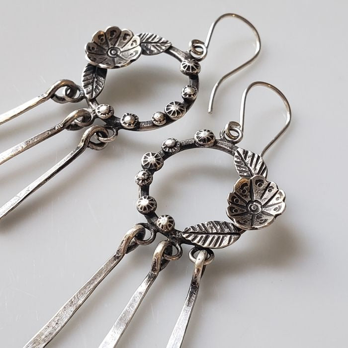 Silver hoop dangle earrings
