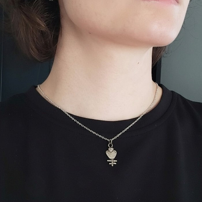 Silver milagros charm pendant