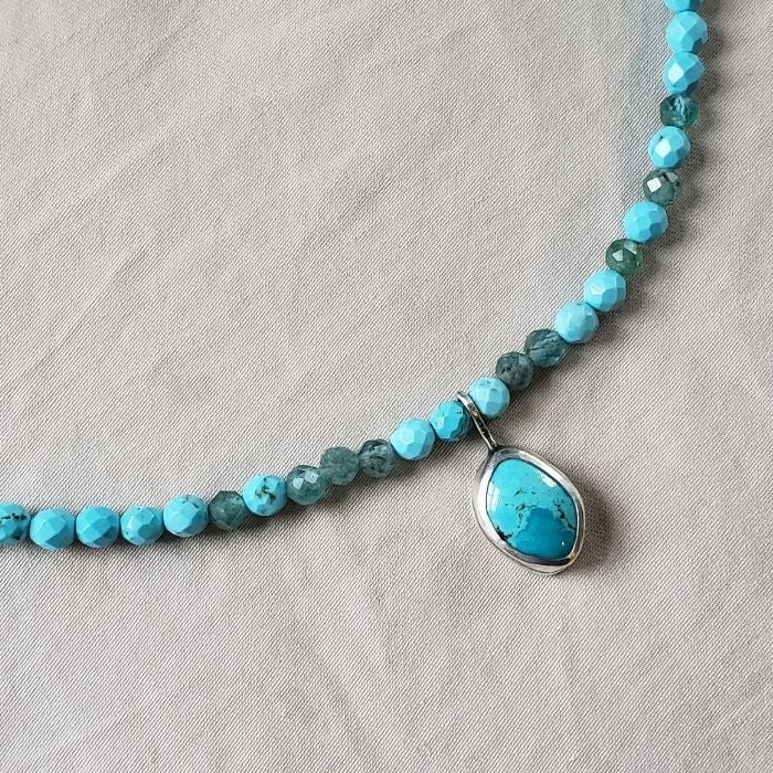 Gemstone necklace with turquoise pendant