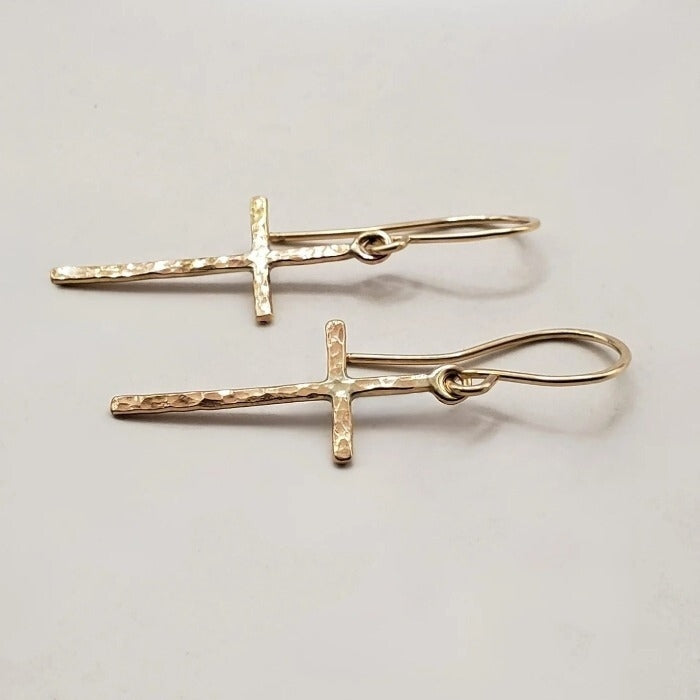 Gold cross earrings with texture