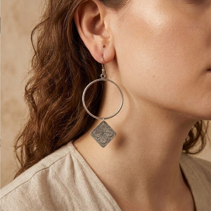 Large mismatched hoop earrings