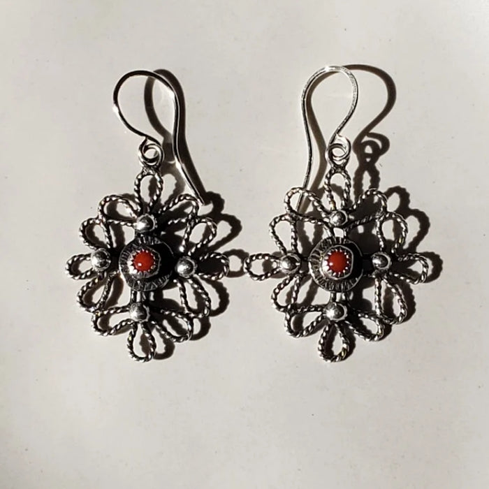 Silver scroll earrings with red coral