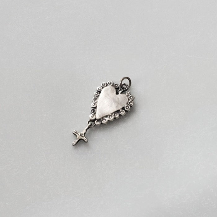 Ruffled silver heart pendant