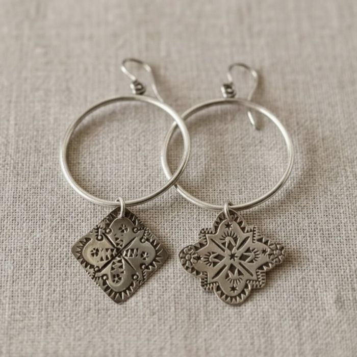 Large mismatched hoop earrings