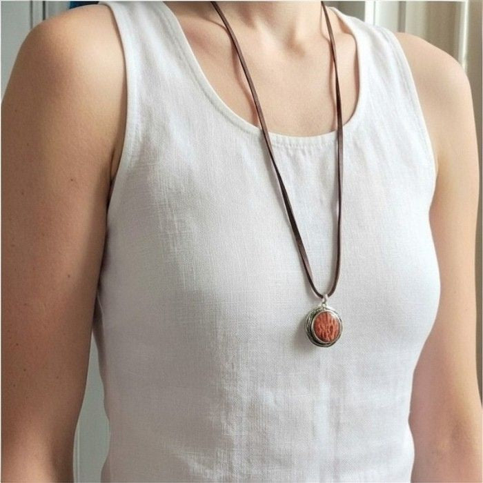 Sterling silver and petrified wood pendant