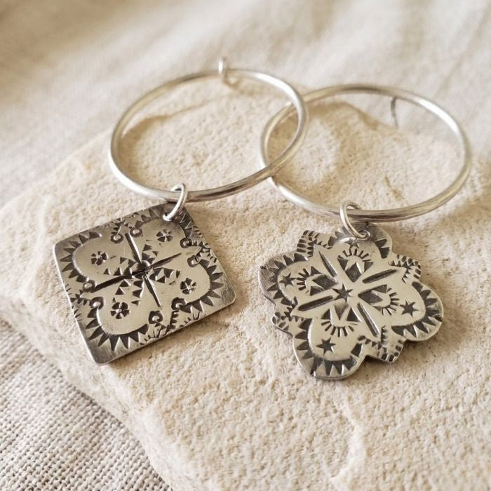 Large mismatched hoop earrings