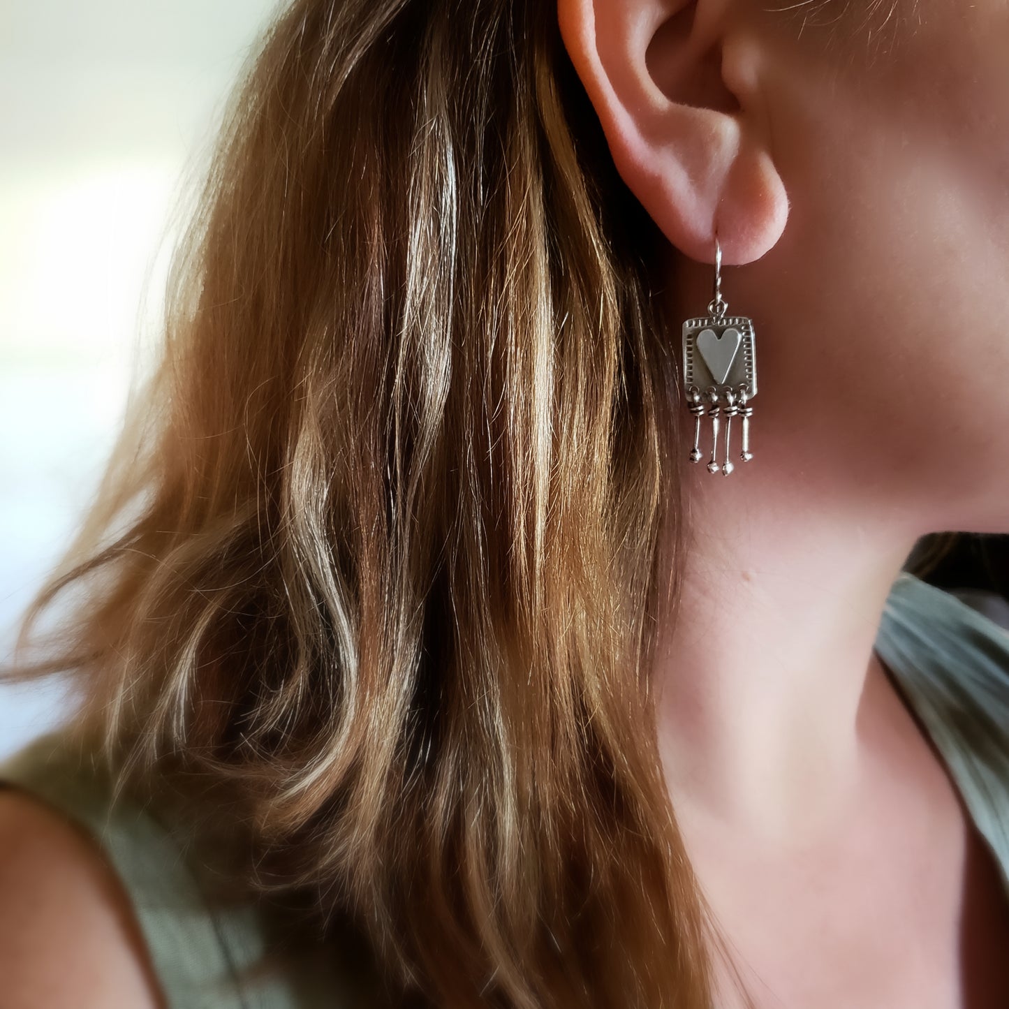Sterling silver heart dangle earrings